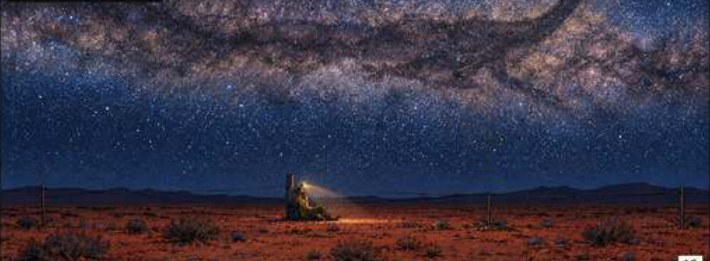 A father beneath the Milky Way in the Australian desert, a panel from Quantum Echoes